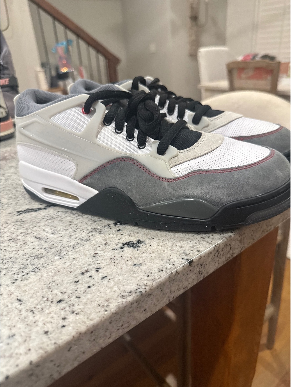 Worn once Men’s size 12.5 Air Jordan 4 RM 'Black Light Bone'